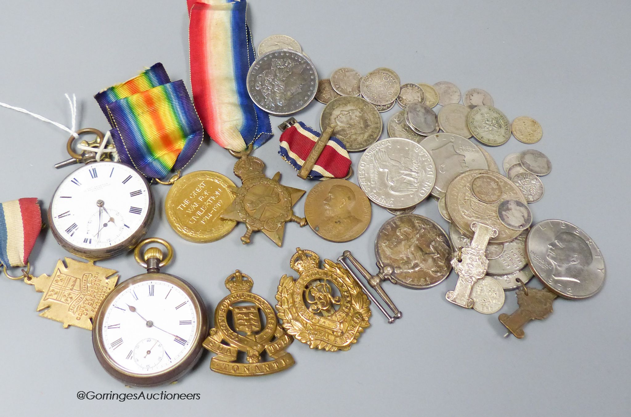 A 1562 shilling and other assorted coinage, two pocket watches and a group of mixed medals including a WWI trio.